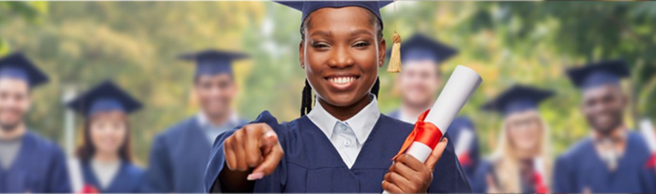 graduate wearing a gown holding her scroll, graduated with Custodian Education Endowment Plan